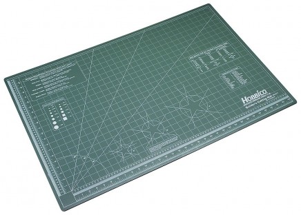 Set yourself up with a cutting mat - particularly if your work area is the dining room table!
